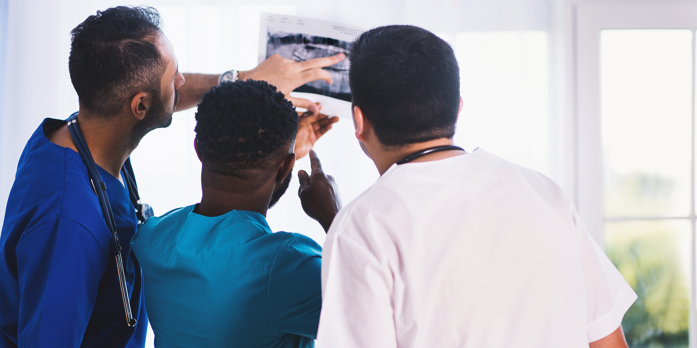 Doctors Discussing with Care Coordination Platform