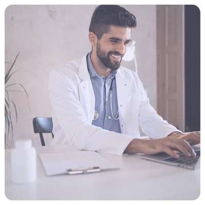 Doctor smiling with access to timely patient information shared by another clinician